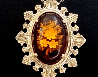 Sun Burst design Hand carved Amber pendant, with flower posy design motif in 9 K gold
