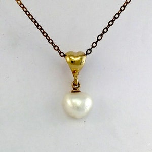Heart Pearl Pendant with a Heart shaped bail in solid 9 carat gold.
