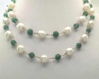 Beaded necklace of Pearls and carved emerald beads on 9 K gold wire links