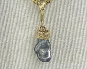 Boxing Glove Pendant, Cook Islands Black Pearl Keshi with solid 9  K gold bail and cuff.