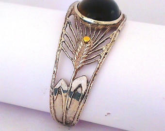 Silver Bracelet with Wheat pattern, and a natural orange grey Tigers eye gem stone.