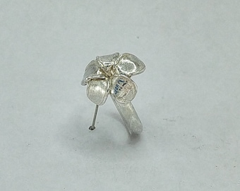 Flower blossom Frangipani Dress Ring in Sterling Silver, with straight band.