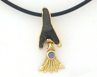Fossil Shark Tooth Pendant in 18 carat gold, with a Sapphire cabochon cut Gem