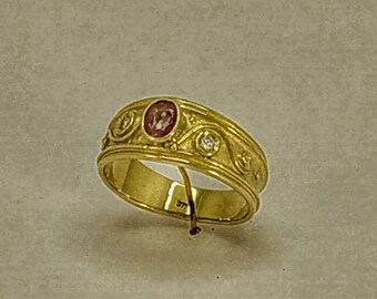 Pink Spinel and Brilliant cut diamonds in a flat , wide Band Dress ring, in 9 carat gold