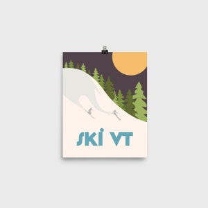 May include: A poster with a minimalist design featuring a snowy mountain slope with two skiers, a forest of green trees, and a yellow sun in a dark purple sky. The text "ski VT" is in blue at the bottom of the poster.