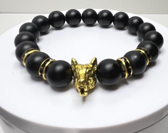 Handcrafted Men's Matte Black 12mm Onyx and Gold Plate Wolf Stretch Bracelet