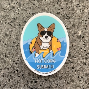 May include: A sticker featuring a cartoon corgi wearing sunglasses and a watermelon float in a blue ocean. The text "Hot Corg Summer" is written below the corgi, and the text "@dalous_oliver_the_corgi" is written below that.