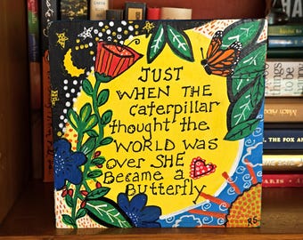 6x6 butterfly collage. Paper and acrylic on wood.