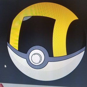 May include: A yellow and black Poke Ball with a white and gray center. The Poke Ball is a popular collectible item for fans of the Pokemon franchise.