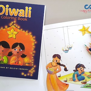 May include: A coloring book with the title "Diwali Coloring Book" and illustrations of two children in traditional Indian clothing. The cover features a star and lights, suggesting a festive theme.