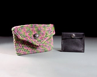 May include: Two small purses, one crocheted in pink and green with a silver button, and one black leather with a silver button.