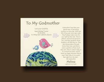 May include: An illustration of a pink and blue bird with the text "To My Godmother" and "Love your Godchild, Ryan Michael Turner 10.26.2014 St. Philip Neri Catholic Church". The text describes the special qualities of a godmother.