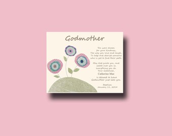 May include: A card with a floral design and the text "Godmother" in brown lettering. The card includes a poem about the importance of a godmother and the date "January 11, 2014".