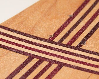 Purple Striped Kicktial Pin Skateboard Deck