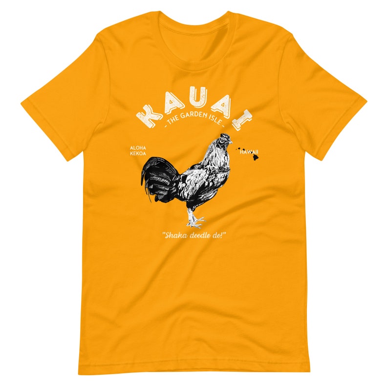 May include: Yellow t-shirt with a black and white rooster illustration. The text "Kauai - The Garden Isle -" is above the rooster. The text "Aloha Kekoa" is to the left of the rooster and "Hawaii" is to the right. The text "Shaka doodle do!" is below the rooster.