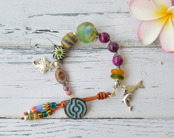 Eclectic bead bracelet with Ocean inspired charms and African trade beads, mixed media jewelry, Unique button bracelets, spanish jewelry