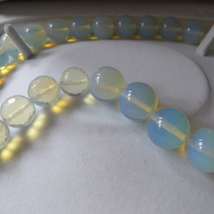OPALITE light  aquamarine  necklace/ choker, 22 ins long, 10 mm rounds, boxed/ 1.5 lbs