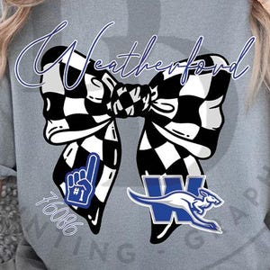 May include: A grey t-shirt with a large bow design in black and white chequered pattern. The word "Weatherford" is written in blue script above the bow. Below the bow are two blue and white graphics, one with a hand gesture and the number one, and the other with a kangaroo.