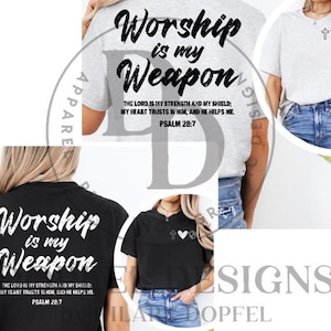 May include: A collection of t-shirts in various colors, including black and gray, featuring the phrase "Worship is my Weapon" in a bold, stylized font. The text "The Lord is my strength and my shield; my heart trusts in Him, and He helps me. Psalm 28:7" is also printed on the shirts.