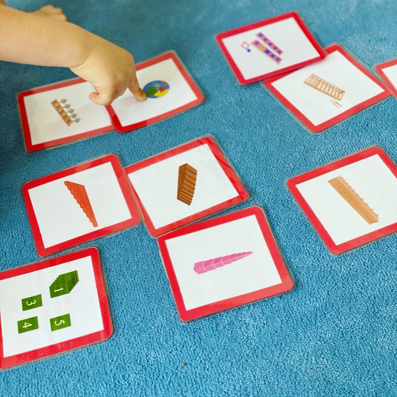 May include: A set of colorful educational cards with different shapes and numbers. The cards are made of thick cardboard and have a glossy finish. The cards are perfect for teaching children about shapes, numbers, and colors.