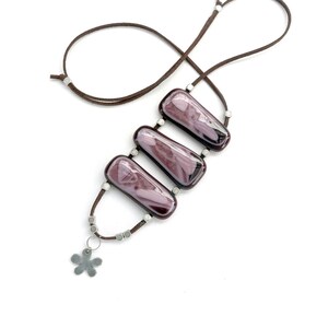 Fused glass necklace in shades of purple and pink