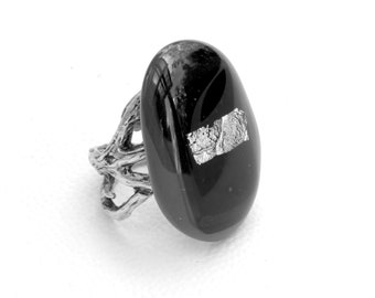 Adjustable black and silver glass ring