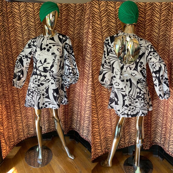 Combined a 60's vintage mod dress pattern with African fabric, and