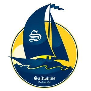May include: A navy blue sailboat with a white 'S' on its sail, set against a yellow and blue circular background. The words "Sailwinds Trading Co." are written below the boat in a decorative font.