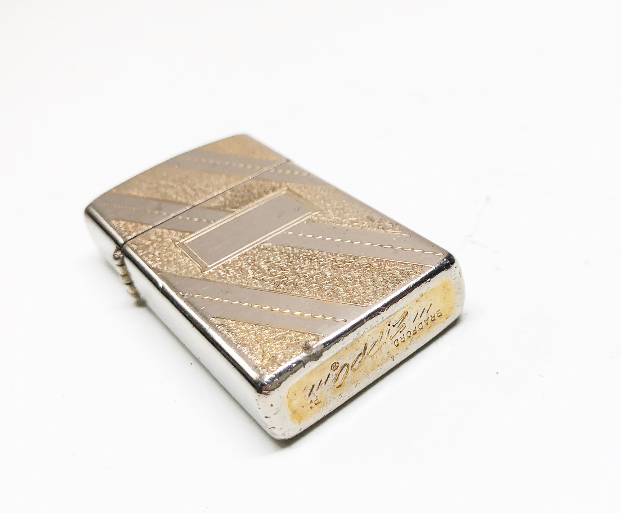 1976 Gold Toned Zippo Slim Working Lighter