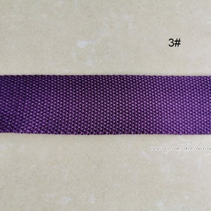 May include: Purple woven webbing, 3#