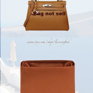 May include: A brown leather handbag with a silver clasp and a strap. The bag is closed and the text "Bag not sell" is written on it. The bag is sitting on a white surface.