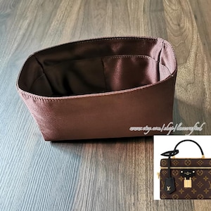 May include: A brown satin handbag organizer with an open top and a rectangular shape. The interior is a darker brown. A smaller image of a brown and tan handbag with a black handle is in the lower right corner.