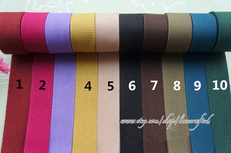May include: Ten rolls of cotton webbing in various colors, including red, pink, purple, yellow, beige, black, brown, khaki, blue, and green. The rolls are numbered 1 through 10. The text "www.etsy.com/shop/lacecrafted" is visible at the bottom of the image.