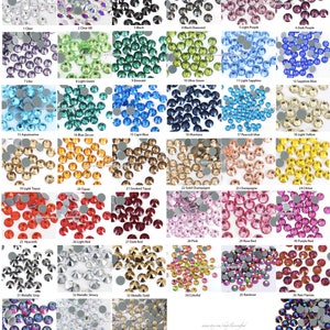 May include: Assortment of 40 different colours of rhinestones, each colour is displayed in a separate square. The rhinestones are arranged in a grid pattern. Each square has a number and a name for the colour of the rhinestones.