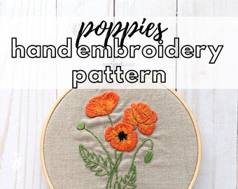 May include: Hand embroidery pattern featuring orange poppies with green leaves and stems, displayed in a wooden embroidery hoop. The text "poppies hand embroidery pattern" is above the design.