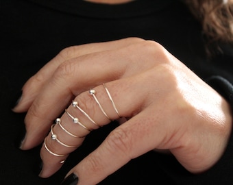 Long rings for middle finger clearance