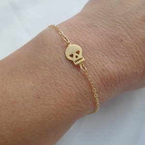 Gold skull charm bracelet, Skull hand bracelet, Edgy chic statement skull bracelet for her, Gothic chic gold chain bracelet