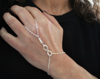 Infinity silver chain pearl slave bracelet, Silver slave bracelet, Slave bracelet ring, Finger bracelet, Bridal bracelet, boho bracelet