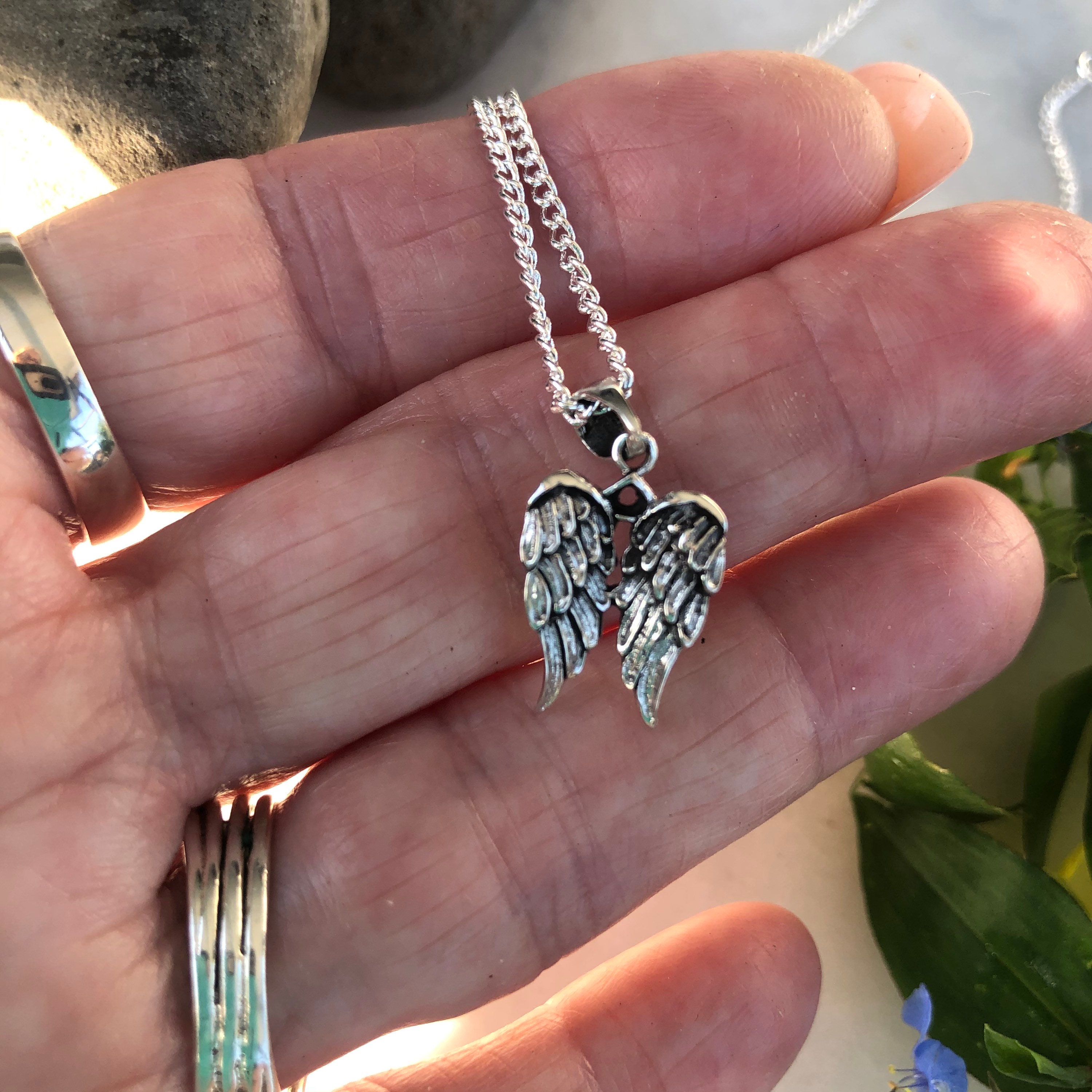 Double angel wing on sale pendant