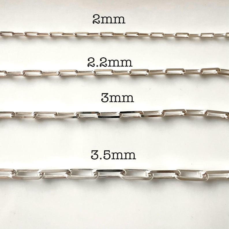 May include: Four silver chains of different sizes, labeled 2mm, 2.2mm, 3mm, and 3.5mm.