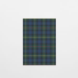 May include: A rectangular textile displaying a traditional tartan pattern. The design is a grid of intersecting lines in blue, green, yellow, and red on a dark base. The pattern is symmetrical and evenly spaced, a classic design.