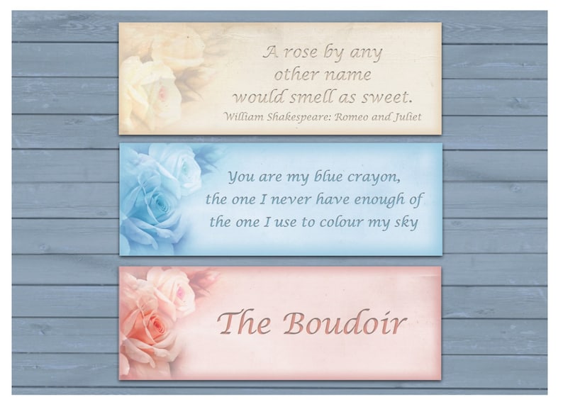 May include: Three decorative cards with floral designs and quotes. The top card is cream with a white rose and a quote from Romeo and Juliet. The middle card is blue with a blue rose and a quote about a blue crayon. The bottom card is pink with a pink rose and the text "The Boudoir".