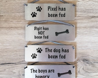The Dog has been Fed Reminder: Personalised Reversible Aluminium Door or Wall Plaque
