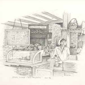 May include: A black and white pencil drawing of a bakery interior. The drawing shows a person standing behind a counter with a menu board and a display case of baked goods. The text on the menu board reads "MENU". The text at the bottom of the drawing reads "BREAD STORE - NEW ORLEANS Nov. 92"