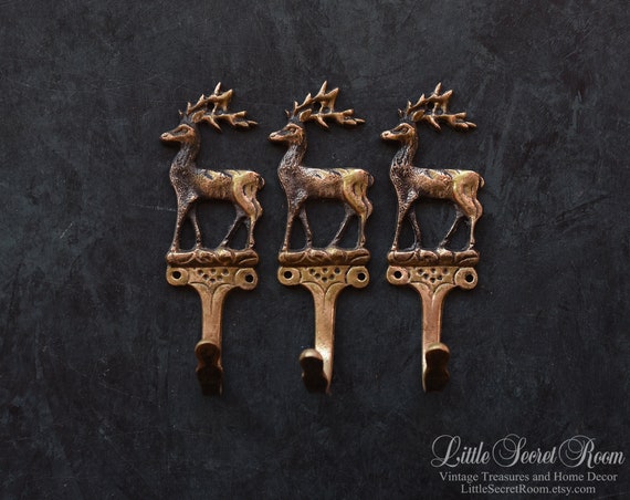 Small Row of 3 Antique Brass Stag Hooks