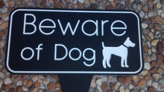 beware of dog yard sign