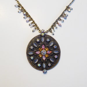 Retired Lia Sophia Large Round Medallion with Crystals  bronze tone, pink, aurora borealis, citrine crystal, Pendant necklace