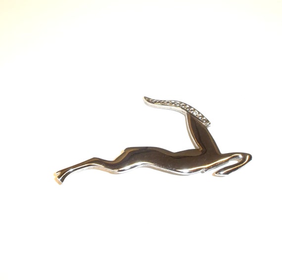 Vintage Sleek Bright Silvertone Gazelle Brooch with Rhinestone Eye