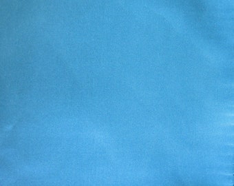 Polyester Lining in Turquoise blue/Peacock Blue color; 58" wide heavy lining fabric priced per 1 yard