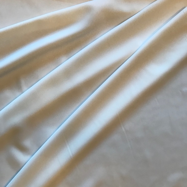 Polyester Peachskin fabric in Ivory color; 58" wide, 100% Polyester peachskin; Ivory bridal fabric, Priced per yard